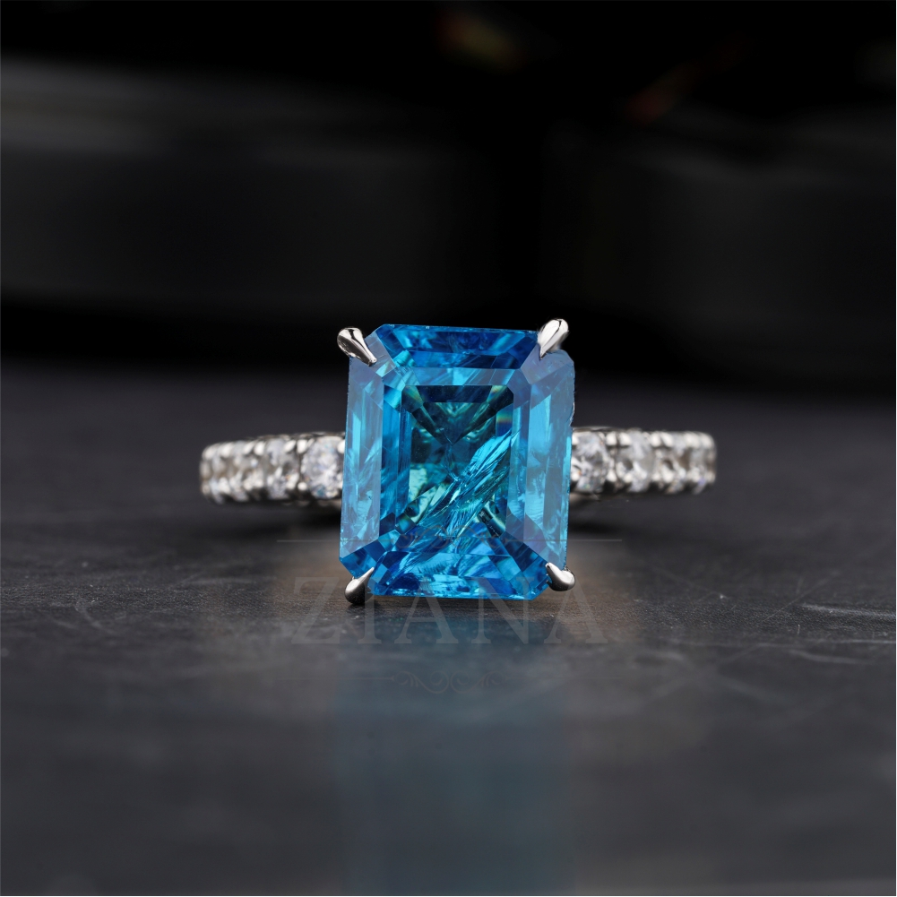 Emerald-Cut Blue Topaz Ring with Diamond Band